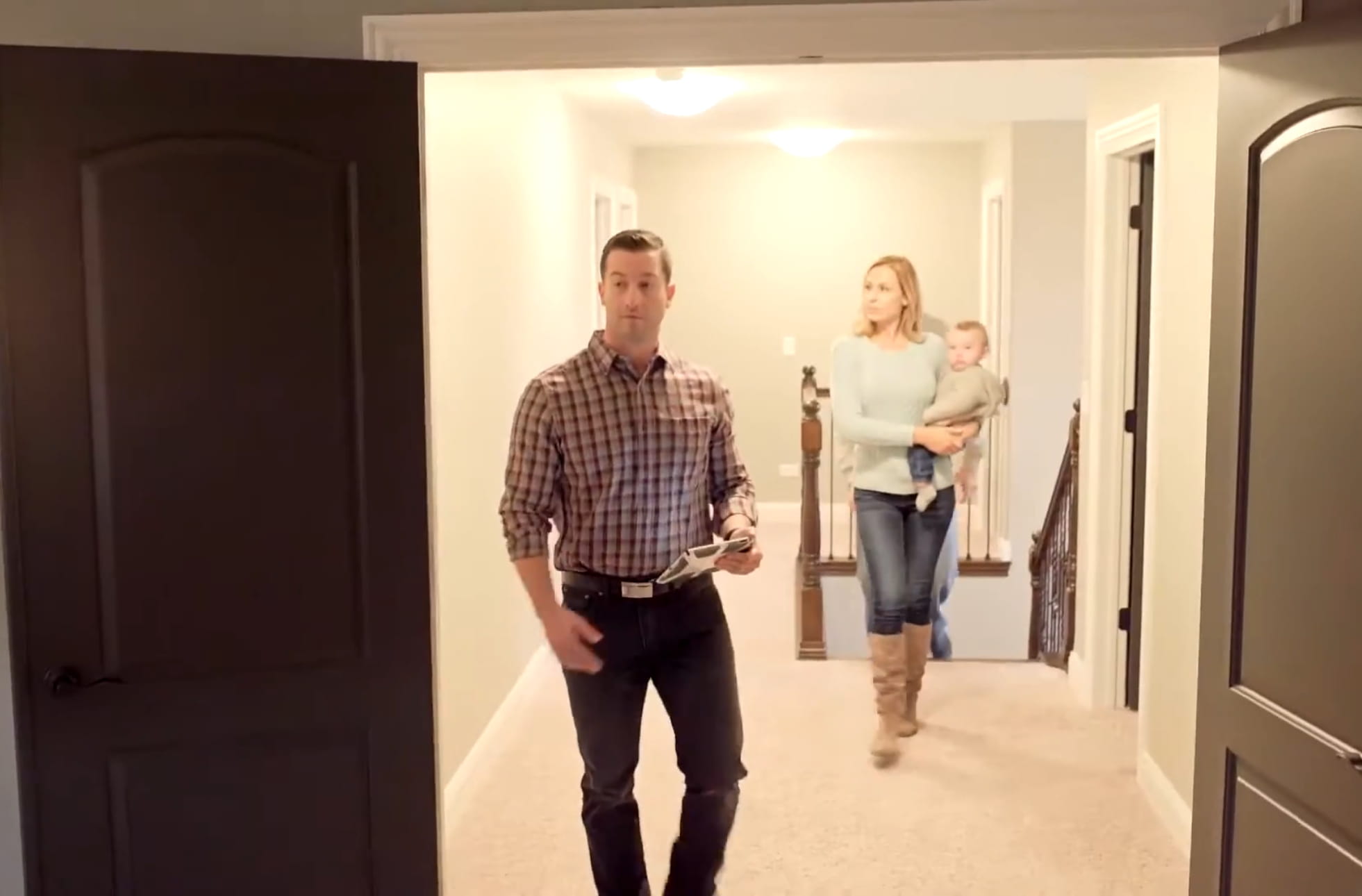 Home buyers touring a house for sale in the southwest suburbs of Chicago